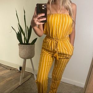 yellow striped jumpsuit with tie waistline